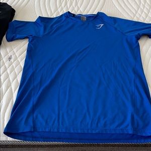 Gymshark blue arrival shirt